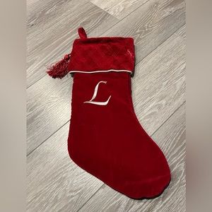 Large “L” Monogram Christmas stocking in red & white.